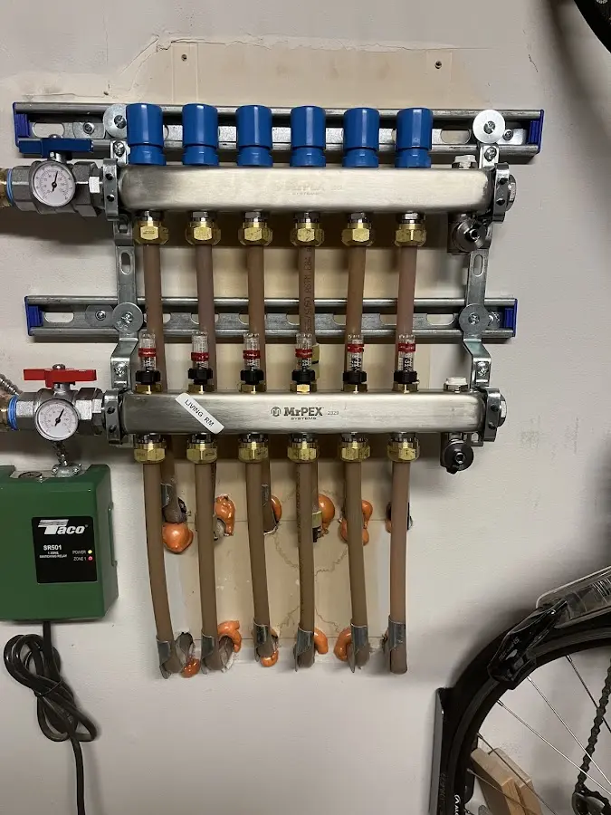 Plumber performing Leak Detection at a residential property in Otis Orchards-East Farms